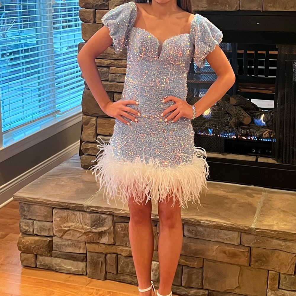 Sherri Hill dress, Jim Ball custom earrings and bracelet.